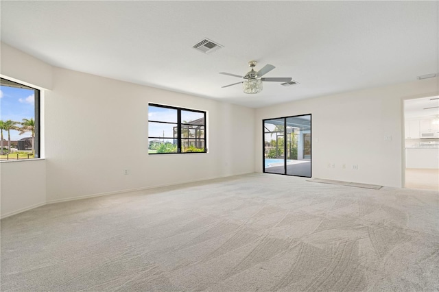 1457 Sea Fan Dr, Punta Gorda, FL 33950 - empty room with carpet flooring and ceiling fan