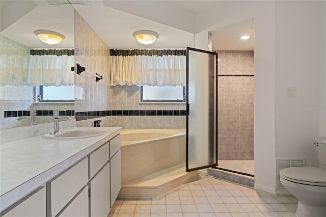 1457 Sea Fan Dr, Punta Gorda, FL 33950 - full bathroom with vanity, a garden tub, a stall shower, and tile patterned flooring