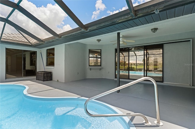 1457 Sea Fan Dr, Punta Gorda, FL 33950 - swimming pool featuring a patio area, glass enclosure, and a ceiling fan