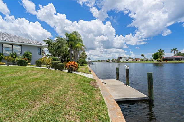 1457 Sea Fan Dr, Punta Gorda, FL 33950 - dock with a water view and a lawn