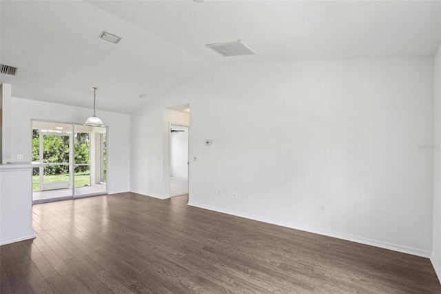 5260 Jessamine Ave, North Port, FL 34291 - spare room featuring dark wood finished floors and vaulted ceiling