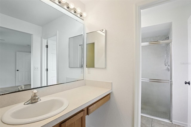 5260 Jessamine Ave, North Port, FL 34291 - full bath featuring a stall shower, vanity, and tile patterned floors