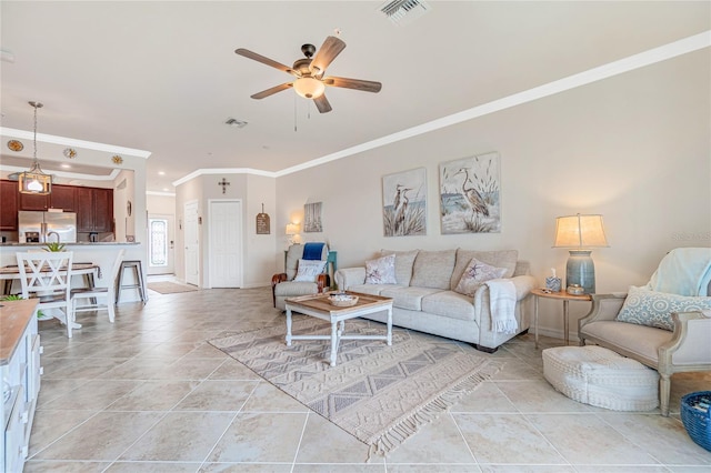 20333 Lagente Cir, Venice, FL 34293 - living room featuring crown molding, a ceiling fan, and light tile patterned floors