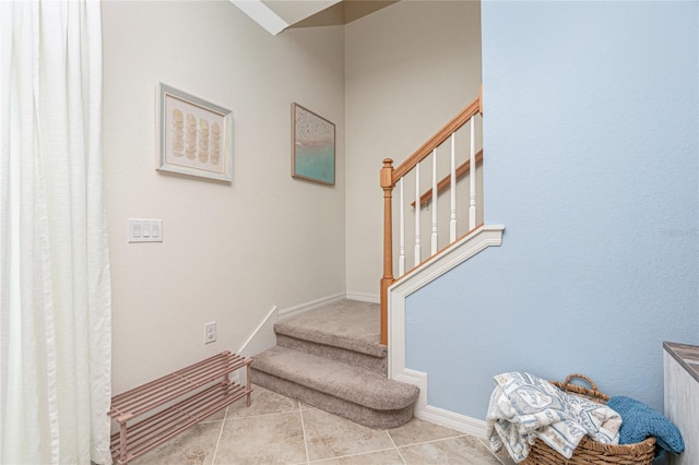 20333 Lagente Cir, Venice, FL 34293 - stairs with tile patterned floors and baseboards