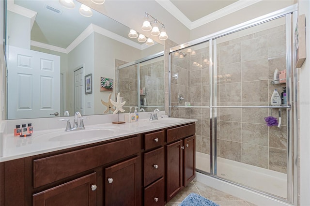 20333 Lagente Cir, Venice, FL 34293 - bathroom featuring ornamental molding, double vanity, a shower stall, and tile patterned flooring