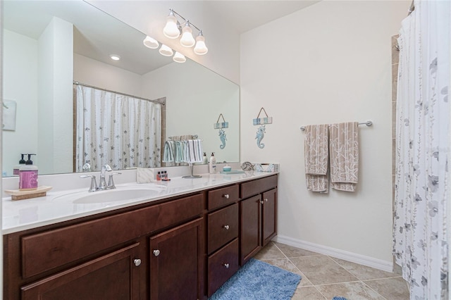 20333 Lagente Cir, Venice, FL 34293 - full bath with double vanity, tile patterned floors, and curtained shower