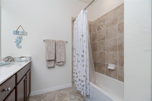 20333 Lagente Cir, Venice, FL 34293 - full bath with vanity, shower / bath combo with shower curtain, and tile patterned floors