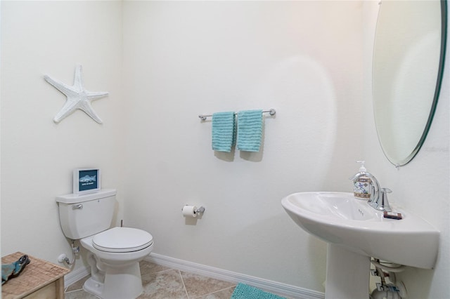 20333 Lagente Cir, Venice, FL 34293 - half bathroom with toilet and tile patterned floors