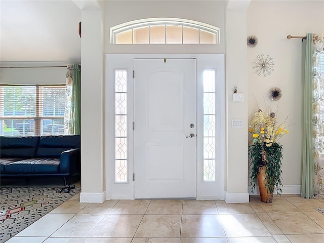 1323 Algiers St, Punta Gorda, FL 33980 - entrance foyer with healthy amount of natural light, light tile patterned floors, and a towering ceiling