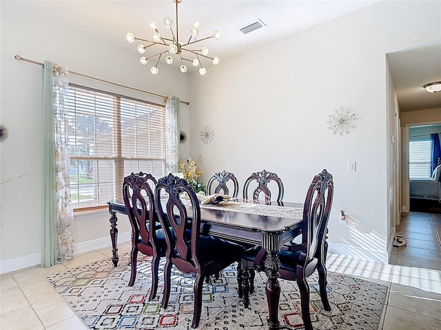 1323 Algiers St, Punta Gorda, FL 33980 - dining area featuring a chandelier and light tile patterned flooring
