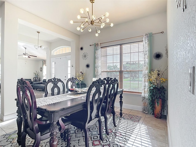 1323 Algiers St, Punta Gorda, FL 33980 - dining room with a chandelier, light tile patterned flooring, and ceiling fan