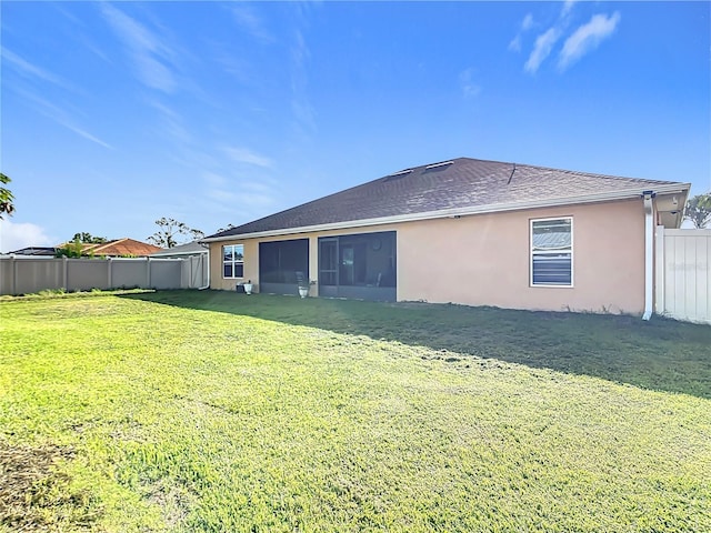 1323 Algiers St, Punta Gorda, FL 33980 - back of house with stucco siding, a sunroom, and roof with shingles
