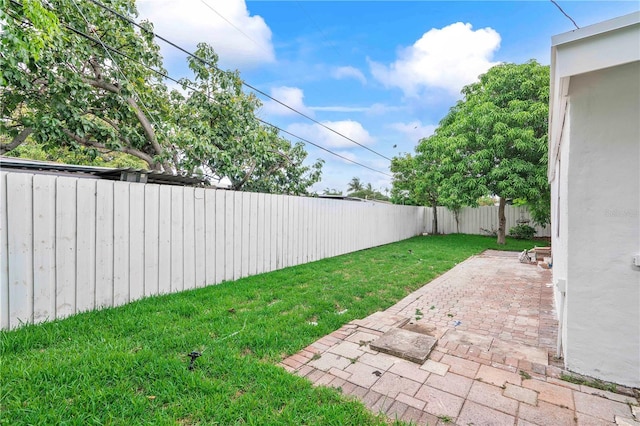 1541 NE 32nd Pl, Pompano Beach, FL 33064 - fenced backyard featuring a patio