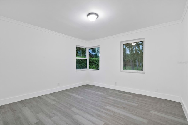 1541 NE 32nd Pl, Pompano Beach, FL 33064 - empty room featuring wood finished floors and ornamental molding