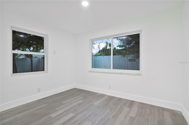 1541 NE 32nd Pl, Pompano Beach, FL 33064 - empty room featuring wood finished floors and recessed lighting