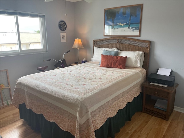 25275 Rampart Blvd Unit 207, Punta Gorda, FL 33983 - bedroom featuring wood finished floors and baseboards