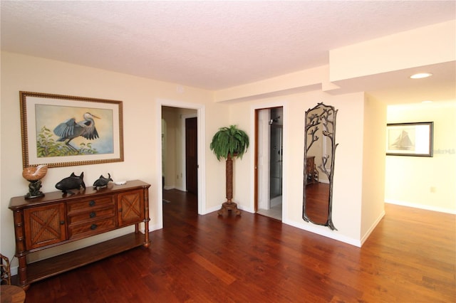 25188 Marion Ave Unit 24, Punta Gorda, FL 33950 - unfurnished room with wood finished floors, a textured ceiling, and recessed lighting