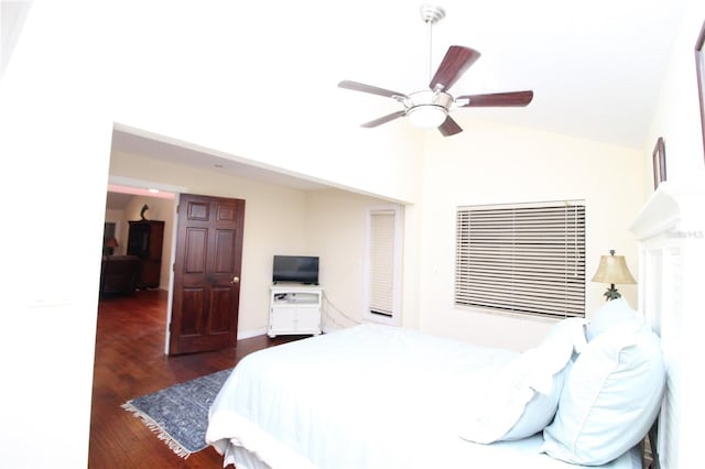 25188 Marion Ave Unit 24, Punta Gorda, FL 33950 - bedroom featuring high vaulted ceiling, dark wood-style flooring, and a ceiling fan