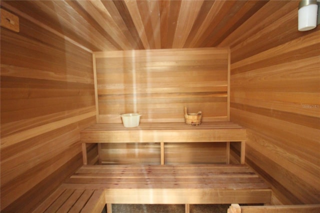 25188 Marion Ave Unit 24, Punta Gorda, FL 33950 - relaxing sauna / steam room with wood ceiling and wood walls