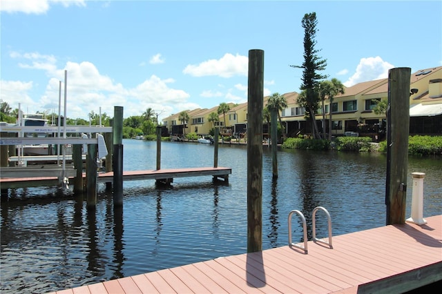 25188 Marion Ave Unit 24, Punta Gorda, FL 33950 - dock featuring a water view and a residential view