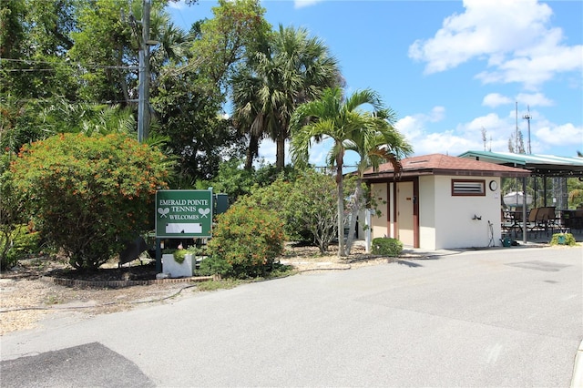 25188 Marion Ave Unit 24, Punta Gorda, FL 33950 - view of front of home with a storage unit and stucco siding
