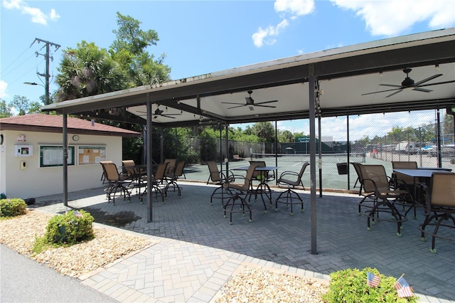 25188 Marion Ave Unit 24, Punta Gorda, FL 33950 - view of patio featuring ceiling fan and a tennis court