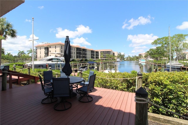 25188 Marion Ave Unit 24, Punta Gorda, FL 33950 - deck with a water view and outdoor dining area
