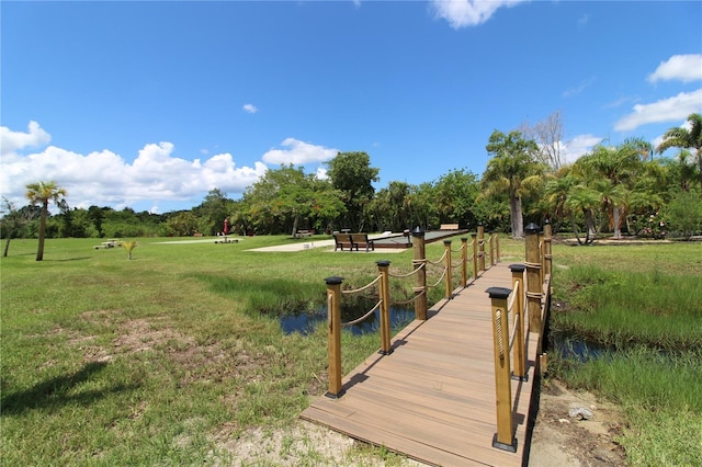25188 Marion Ave Unit 24, Punta Gorda, FL 33950 - view of property's community with a lawn and view of scattered trees