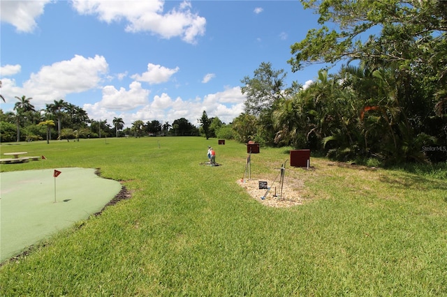25188 Marion Ave Unit 24, Punta Gorda, FL 33950 - view of home's community with a putting green and a yard