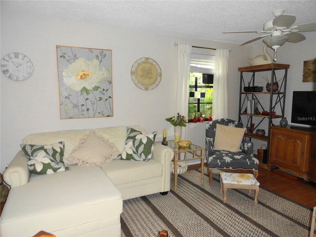 4022 Beaver Ln Unit 700B, Port Charlotte, FL 33952 - living area featuring a textured ceiling and a ceiling fan