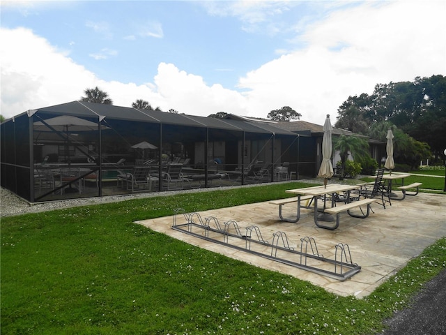 4022 Beaver Ln Unit 700B, Port Charlotte, FL 33952 - view of community with a lawn and a patio