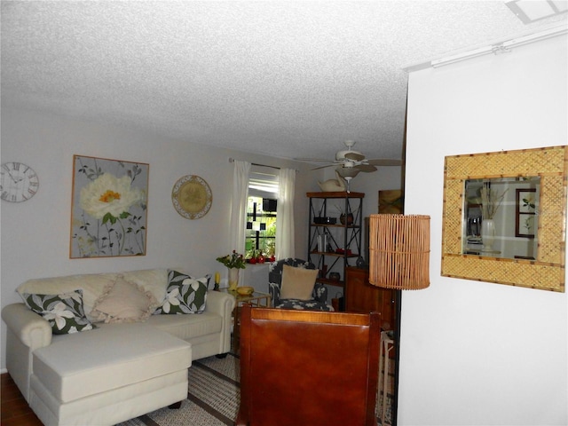 4022 Beaver Ln Unit 700B, Port Charlotte, FL 33952 - living area with a textured ceiling and ceiling fan