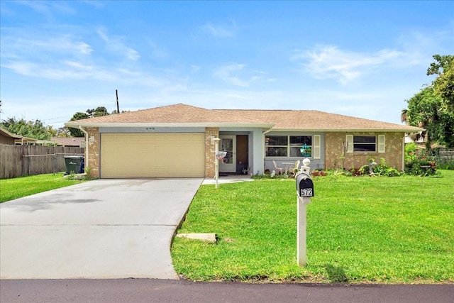 572 Darwin Rd, Venice, FL 34293 - single story home featuring driveway, a garage, and brick siding
