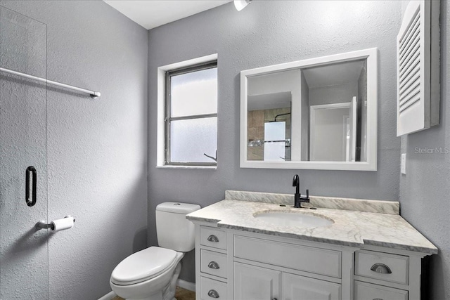 572 Darwin Rd, Venice, FL 34293 - bathroom featuring vanity and a textured wall