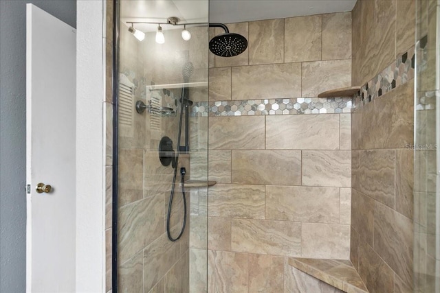 572 Darwin Rd, Venice, FL 34293 - bathroom with tiled shower