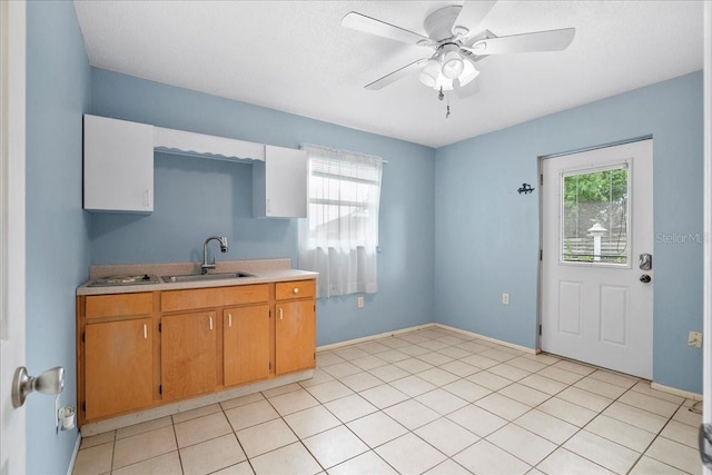 572 Darwin Rd, Venice, FL 34293 - kitchen featuring light countertops and ceiling fan