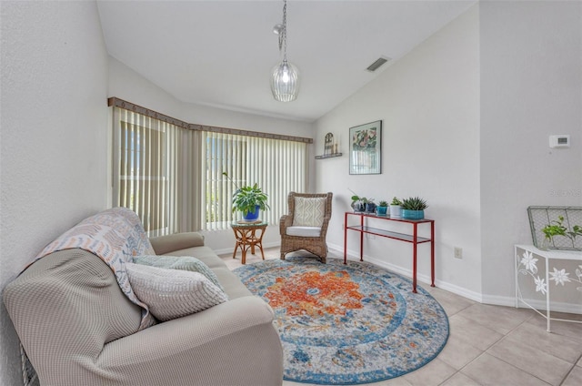 860 Silver Springs Ter NW, Port Charlotte, FL 33948 - sitting room with lofted ceiling and tile patterned floors