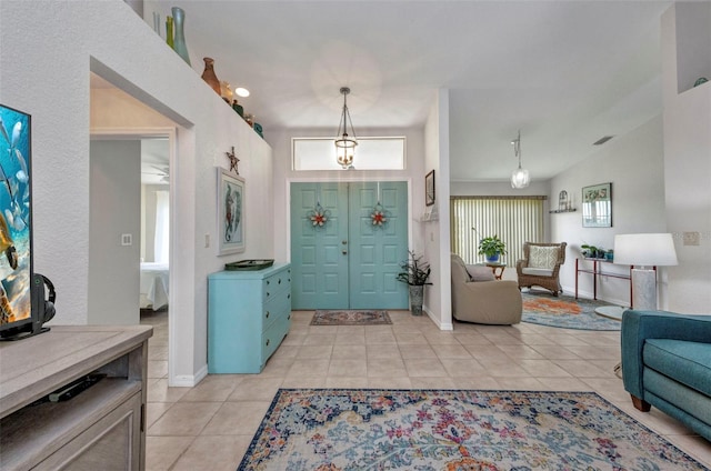 860 Silver Springs Ter NW, Port Charlotte, FL 33948 - entrance foyer featuring light tile patterned floors