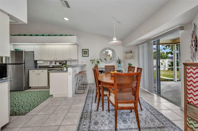 860 Silver Springs Ter NW, Port Charlotte, FL 33948 - dining area featuring light tile patterned floors
