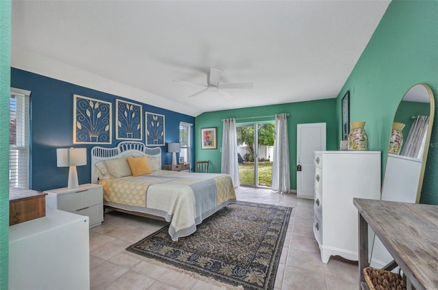 860 Silver Springs Ter NW, Port Charlotte, FL 33948 - bedroom with access to exterior, tile patterned floors, and ceiling fan
