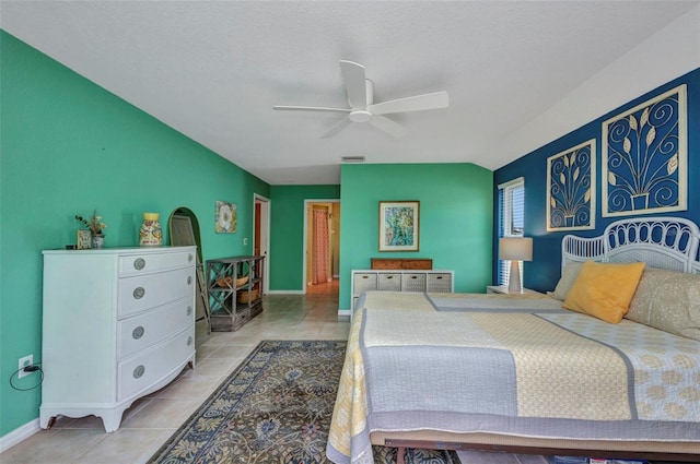 860 Silver Springs Ter NW, Port Charlotte, FL 33948 - tiled bedroom with baseboards and a ceiling fan