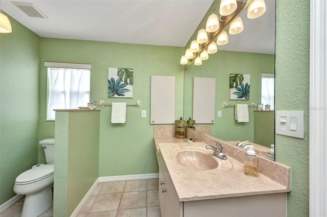 860 Silver Springs Ter NW, Port Charlotte, FL 33948 - bathroom with vanity, tile patterned flooring, and a textured wall