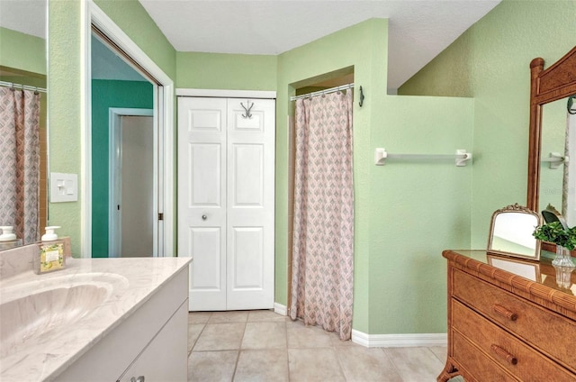 860 Silver Springs Ter NW, Port Charlotte, FL 33948 - bathroom with vanity, tile patterned flooring, and a shower with curtain