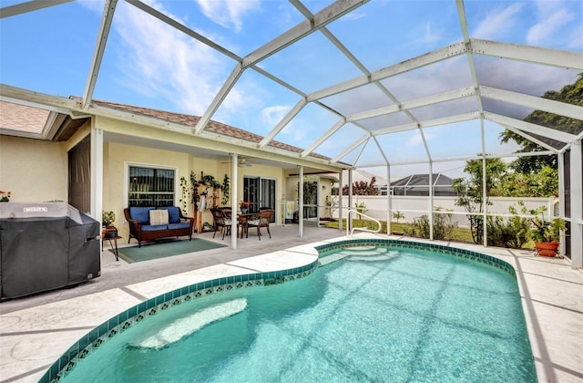 860 Silver Springs Ter NW, Port Charlotte, FL 33948 - view of pool featuring area for grilling, a patio, an outdoor living space, and a lanai