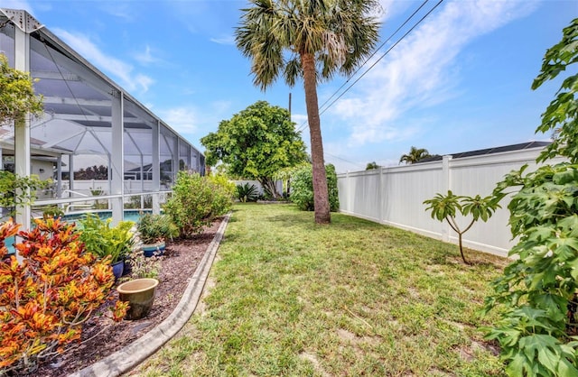 860 Silver Springs Ter NW, Port Charlotte, FL 33948 - fenced backyard featuring glass enclosure