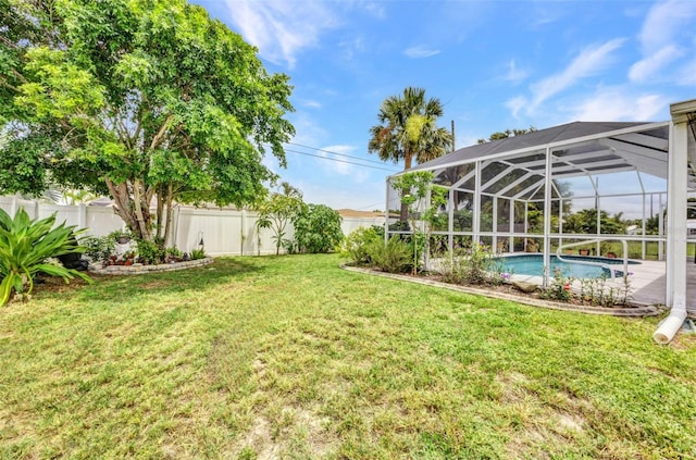 860 Silver Springs Ter NW, Port Charlotte, FL 33948 - fenced backyard featuring an outdoor pool and glass enclosure