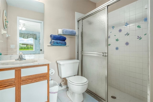 2103 Villaway E, Sebring, FL 33876 - full bath with vanity, a shower stall, tile patterned floors, and a ceiling fan