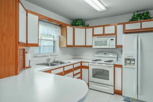 2103 Villaway E, Sebring, FL 33876 - kitchen featuring white appliances and light countertops
