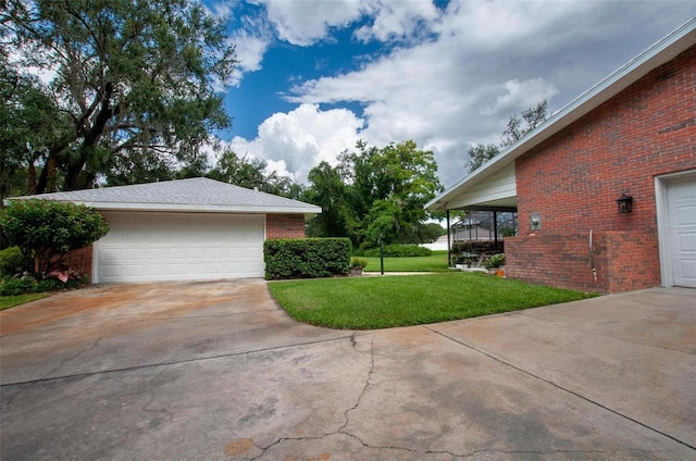 3990 NE Ashley Ter, Arcadia, FL 34266 - view of grassy yard featuring a garage
