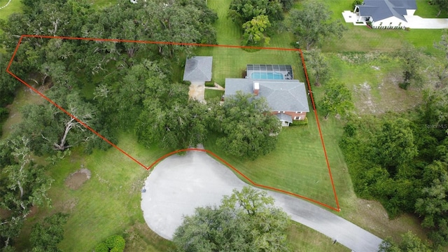 3990 NE Ashley Ter, Arcadia, FL 34266 - aerial view of property and surrounding area featuring property boundaries highlighted